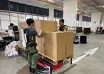 SAF personnel fitted with exoskeleton suits to assemble NDP packs