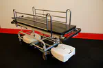 Power-Assisted Hospital Bed for Patient Transport